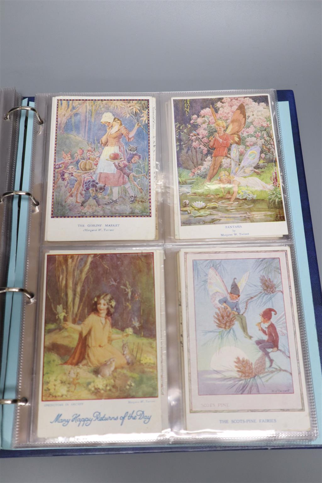Approximately 185 early 20th century postcards, contained within modern vinyl album